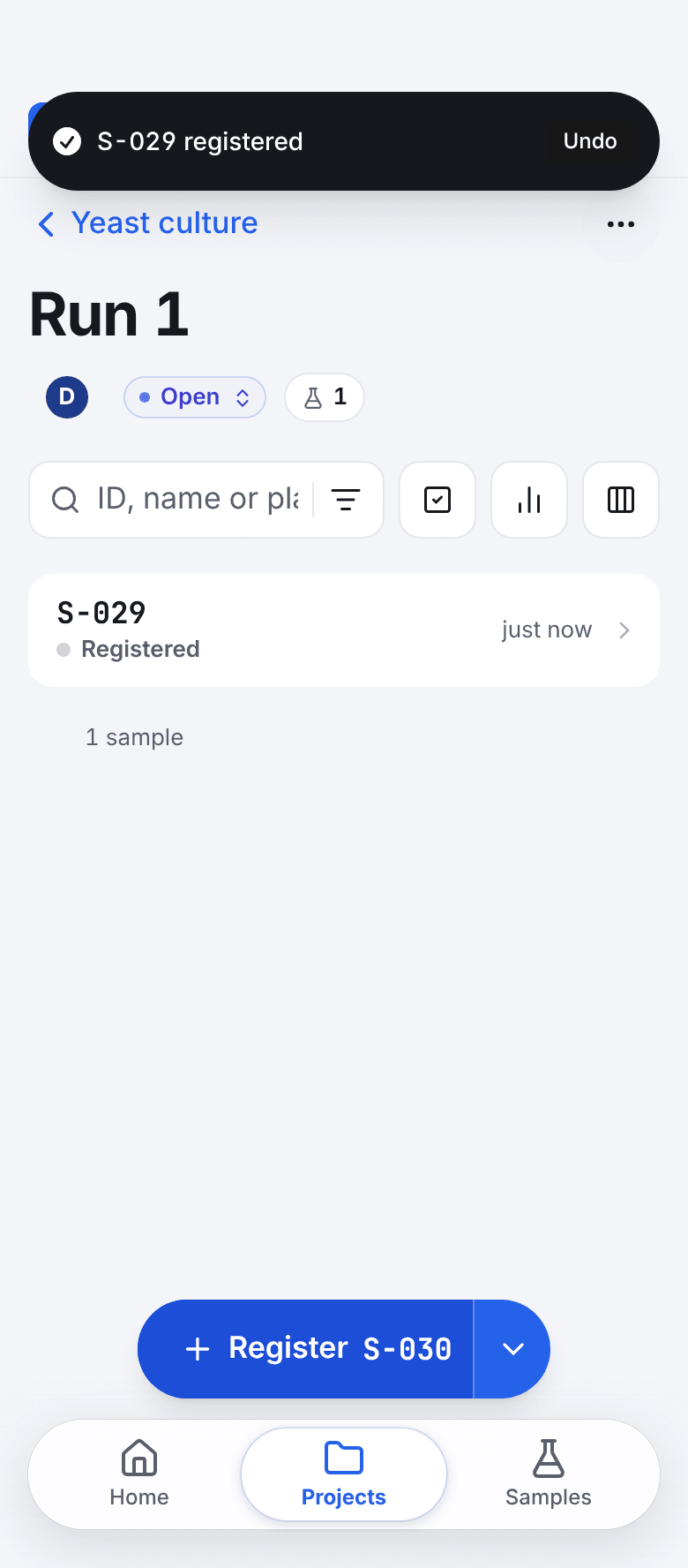 The batch Run 1 after one tap on Register: a message says S-029 registered with an Undo link, the list shows S-029 marked Registered, and the button now offers S-030.
